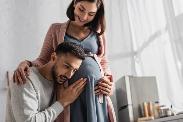 Young Man Gently Hugging Belly Pregnant Woman Kitchen — 스톡 사진