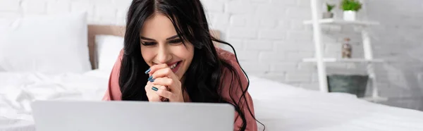 Cheerful Young Woman Clenched Hands Looking Laptop Bedroom Banner — Stock Photo, Image