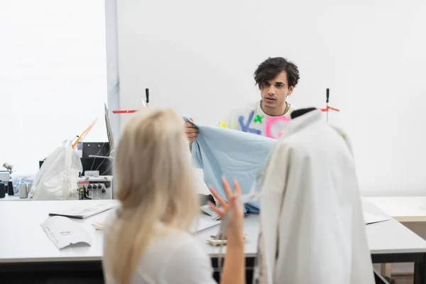 Back View Blurred Designer Gesturing While Talking Colleague Fabric Sample — Stock Photo, Image