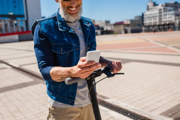 Cropped View Happy Mature Man Using Smartphone While Riding Scooter — 스톡 사진