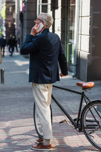 Middle Aged Man Blazer Glasses Talking Smartphone Standing Bicycle Modern — Foto de Stock