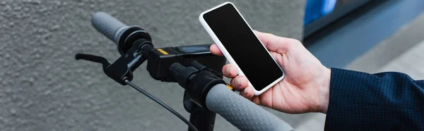 Cropped View Mature Businessman Holding Smartphone Blank Screen Scooter Banner — Foto de Stock