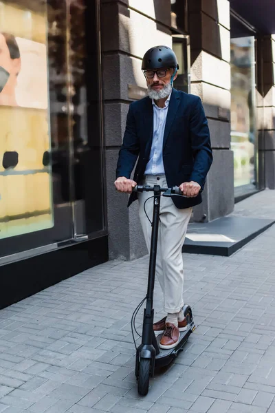 Full Length Mature Businessman Blazer Helmet Riding Electric Scooter — Stok Foto