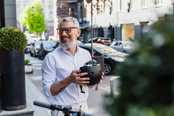 Smiling Mature Man Shirt Holding Helmet Electric Scooter Street — Φωτογραφία Αρχείου