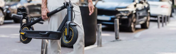 Partial View Middle Aged Man White Shirt Carrying Electric Scooter — Zdjęcie stockowe