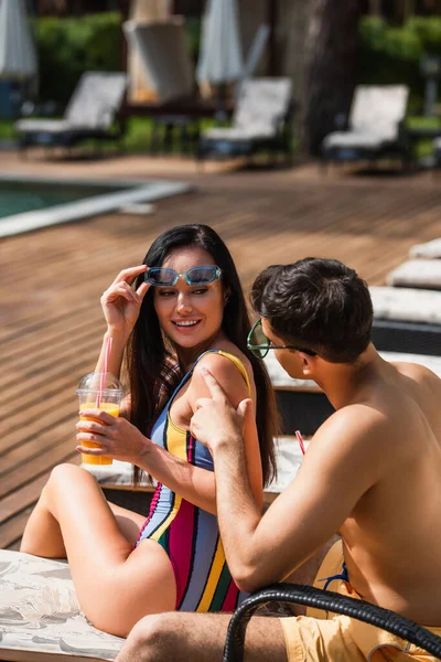 Man Swimming Trunks Sitting Girlfriend Takeaway Drink Resort — Stock Photo, Image