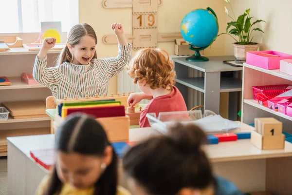 Excited Girl Showing Win Gesture Boy Blurred Girl Teacher — Stock Photo, Image