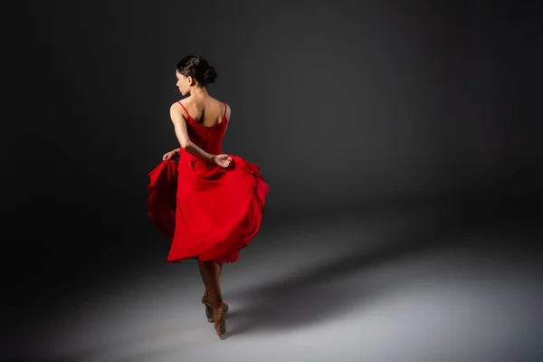 Side View Ballerina Dancing Holding Red Dress Black Background — Stock Photo, Image