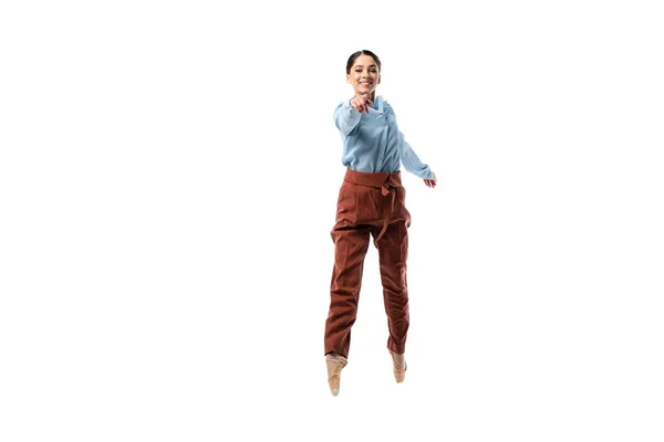 Bailarina Clásica Positiva Apuntando Con Dedo Mientras Salta Aislada Sobre — Foto de Stock