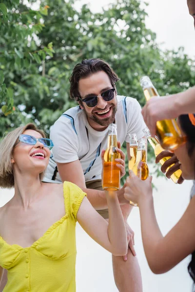 Happy Friends Sunglasses Clinking Bottles Beer Summer Party — Stock Photo, Image