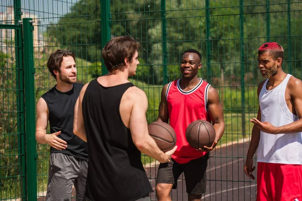 Cheerful African American Man Holding Basketball Ball Friends Talking Outdoors — Stock Photo, Image