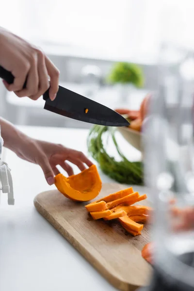 Partial View Woman Knife Ripe Pumpkin Cutting Board Blurred Foreground — Stock Photo, Image