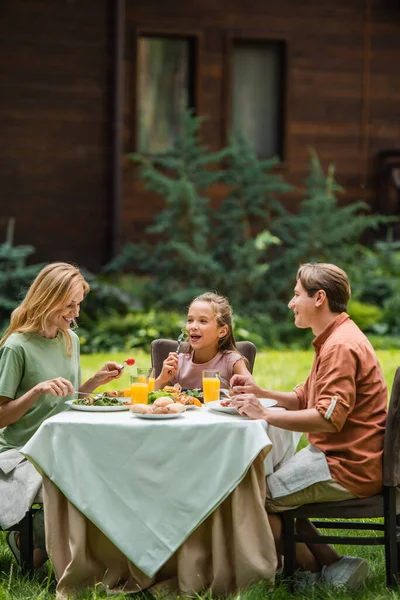 Smiling Family Spending Time Picnic Outdoors — Stockfoto