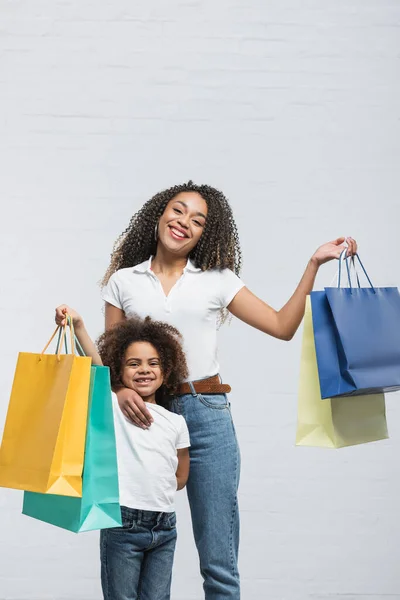 Joyful African American Woman Child Holding Colorful Shopping Bags Grey — Stock Photo, Image