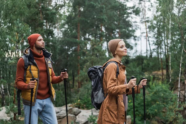 Young Couple Backpacks Trekking Together Hiking Sticks — Stok fotoğraf