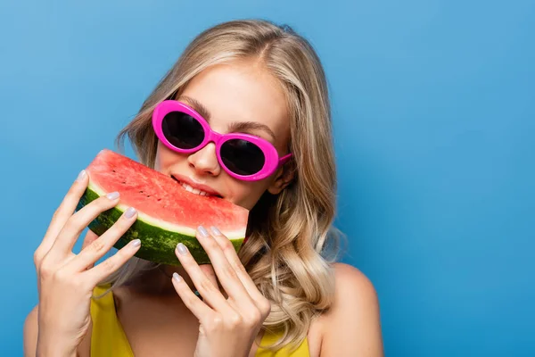 Blonde Young Woman Pink Sunglasses Eating Fresh Watermelon Isolated Blue — Stock Photo, Image