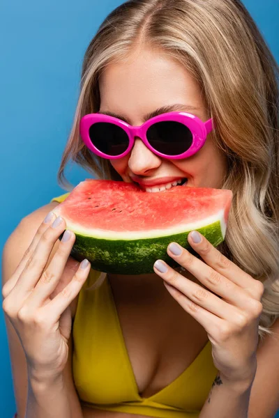 Cheerful Young Woman Pink Sunglasses Eating Fresh Watermelon Isolated Blue — Stock Photo, Image