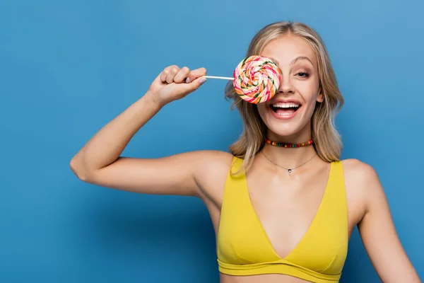 Amazed Young Woman Yellow Bikini Top Covering Eye Sweet Lollipop — Stock Photo, Image