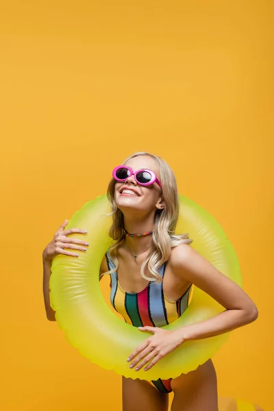 Joyful Young Woman Sunglasses Swimsuit Holding Inflatable Ring Isolated Yellow — Stock Photo, Image