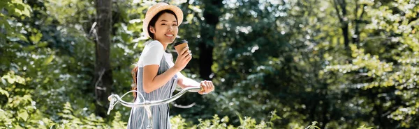 Young Asian Woman Bicycle Takeaway Drink Smiling Camera Park Banner — Stock Photo, Image