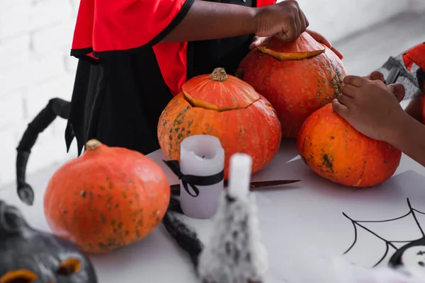 Partial View African American Kids Carving Pumpkins — Stock Photo, Image