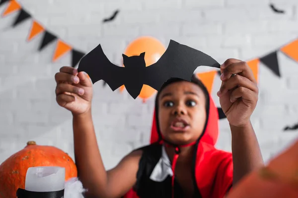 Blurred Scared African American Boy Halloween Costume Holding Paper Cut — Stock Photo, Image