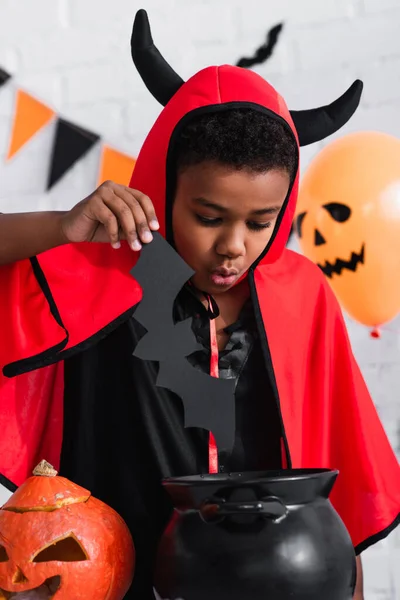 African American Boy Devil Halloween Costume Holding Paper Cut Bat — Stock Photo, Image