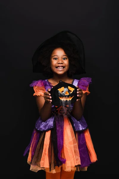 Happy African American Girl Halloween Costume Holding Carved Pumpkin Isolated — Stock Photo, Image