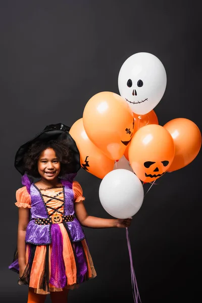 Happy African American Girl Halloween Costume Holding Balloons Isolated Black — Stock Photo, Image