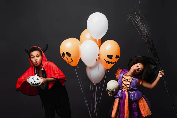 African American Children Halloween Costumes Holding Skull Pumpkin Balloons Isolated — Stock Photo, Image