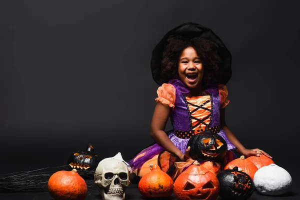Excited African American Girl Witch Costume Pointed Hat Carved Pumpkins — Stock Photo, Image