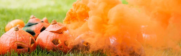 Orange Smoke Carved Pumpkins Green Lawn Banner — Stock Photo, Image