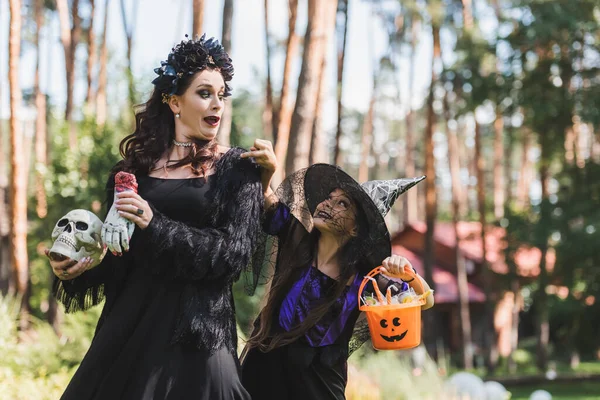 Kid Witch Hat Pointing Halloween Bucket Candies Excited Mom Vampire — Stock Photo, Image