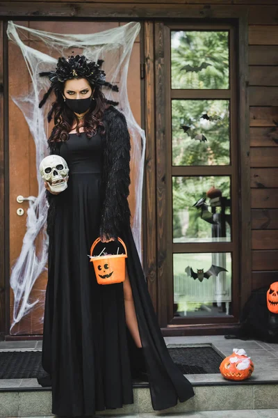 Woman Black Halloween Costume Holding Spooky Skull Bucket Sweets House — Stock Photo, Image