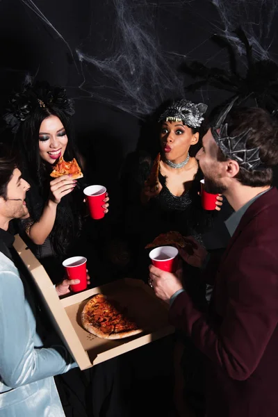 African American Woman Wolf Mask Eating Pizza Multiethnic Friends Halloween — Stock Photo, Image