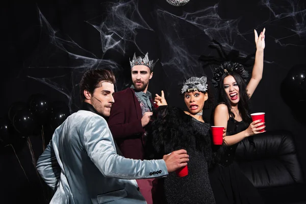 Interracial Women Showing Victory Gesture While Dancing Excited Friends Halloween — Stock Photo, Image