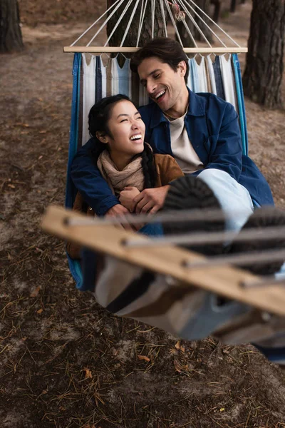 Cheerful Interracial Couple Hugging Hammock Weekend — Stock Photo, Image