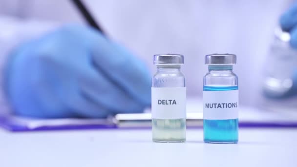 Gewassen Beeld Van Vaccins Met Delta Mutaties Belettering Buurt Van — Stockvideo