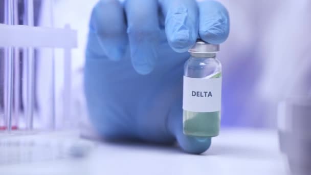 Cropped View Scientist Latex Glove Holding Jar Delta Lettering Royalty Free Stock Footage