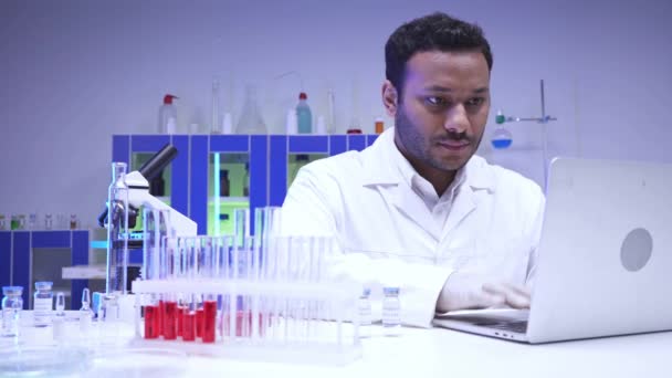 Indian Scientist Using Laptop Microscope Test Tubes Lab Royalty Free Stock Footage