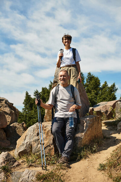 Active seniors explore scenic trails together, embracing nature and adventure on their journey.