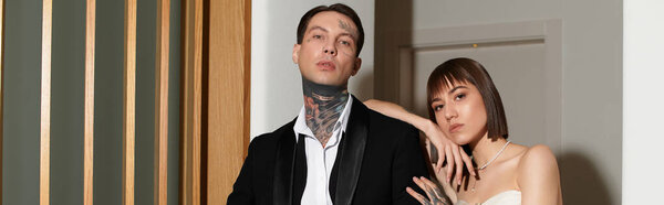 A young couple explores their deep connection in a charming hotel setting, radiating love and joy.