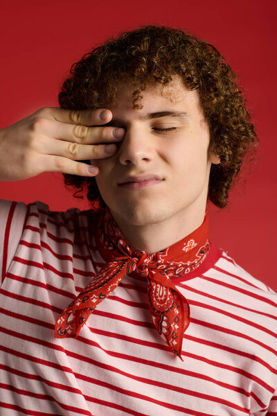 Teenager presents an active and fashionable stance while showcasing a unique sense of style