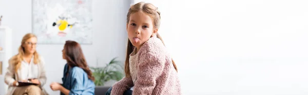 Daughter fooling around while mother talking to psychologist, banner — Stock Photo