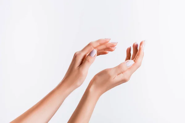 Vue recadrée de la femme montrant isolé sur blanc — Photo de stock