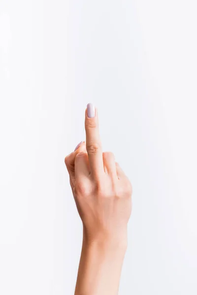 Abgeschnittene Ansicht einer Frau, die den Mittelfinger isoliert auf Weiß zeigt — Stockfoto