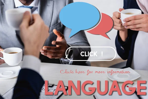 Partial view of multicultural business partners and translator drinking coffee, speech bubbles near language lettering and click icon illustration — Stock Photo