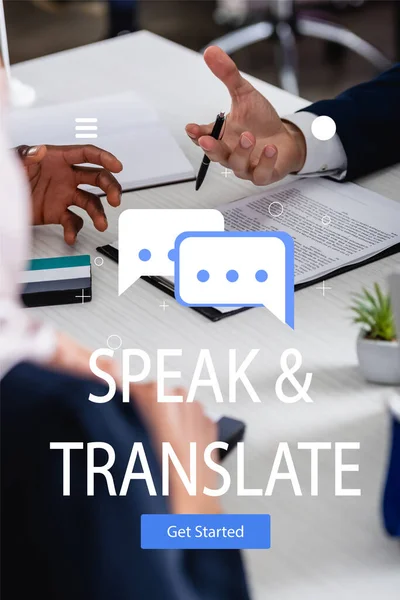 Cropped view of multicultural business partners near contract, speak and translate lettering near speech bubbles and get started icon illustration — Stock Photo