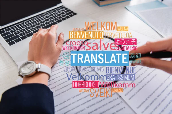 Partial view of interpreter holding magnifier near documents, translate lettering near words in different languages illustration. Translation: 