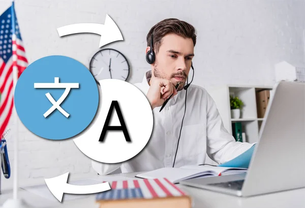 Interpreter in headphones working at laptop near dictionary and usa flag on blurred foreground, icons with arrows illustration — Stock Photo